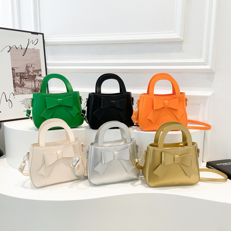 2025 primavera y verano nuevo color sólido bolso de hombro coreano bolso de mujer suave moda simple bolso de arco