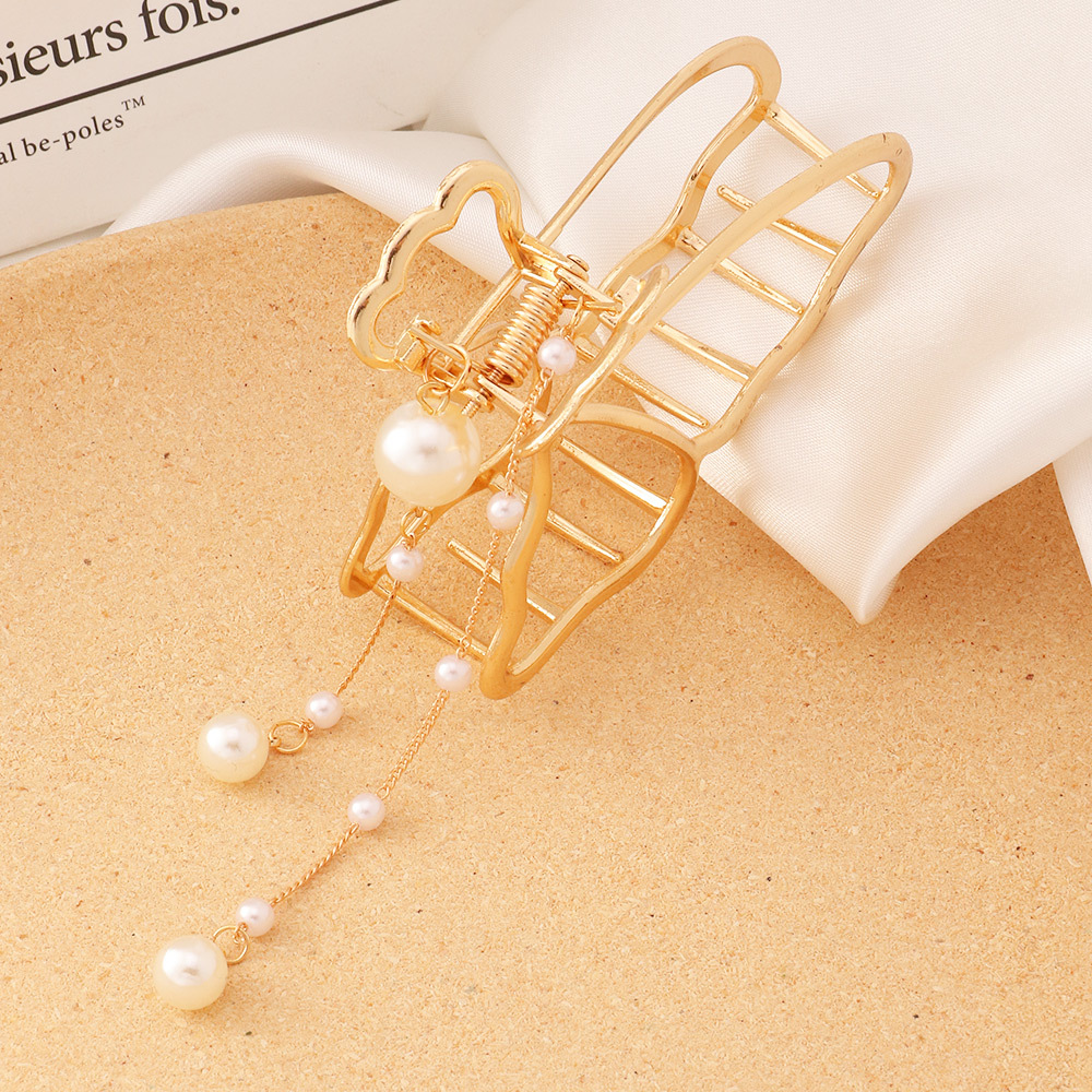 Wholesale Jewelry Pearl Tassel Butterfly Metal Korean Style Catch Clip Nihaojewelry display picture 3