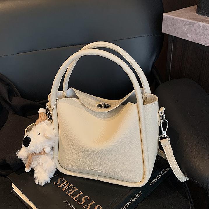 Bolso de cesta de verduras de estilo caliente de comercio exterior para mujer 2025 nuevo bolso de hombro casual simple bolso de cubo de aire occidental salvaje