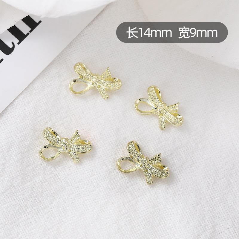 Nueva joyería de uñas, lazo, pajarita de lujo ligero, accesorios de uñas de aleación, accesorios de diamantes de uñas de celebridades de Internet tridimensionales, estilo caliente