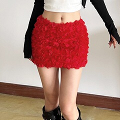 2025外国貿易の婦人服の新型の夜店のファッション的なセクシーな純色の立体の花の超短いタイプの半身のスカートの工場は直接出発します。