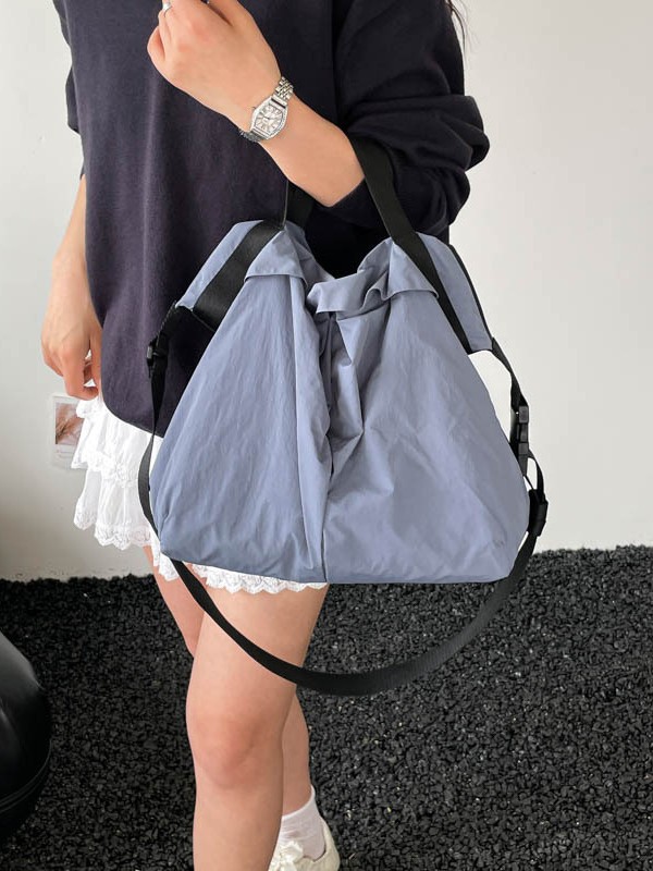 2026 nuevo bolso de nylon coreano ligero de gran capacidad bolso de tela de viaje casual versátil bolso de hombro resistente al desgaste mujer