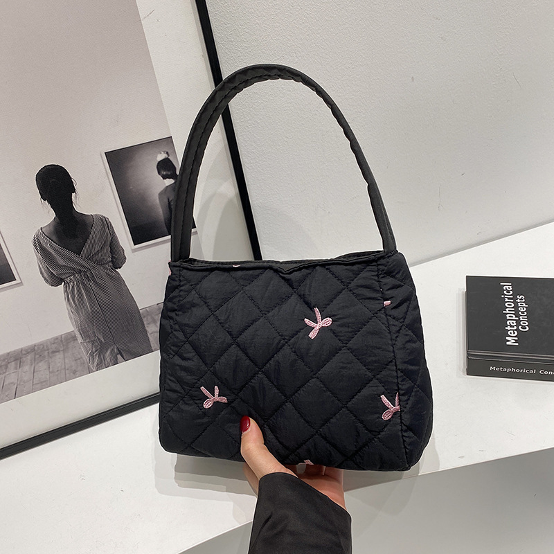 2024 nuevo bolso de arco de bordado, bolsa de maquillaje de gran capacidad, bolsa de lavado, bolsa de ocio, bolsa de mujer