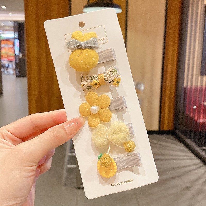 Juego de cinco piezas de bolsa amarilla