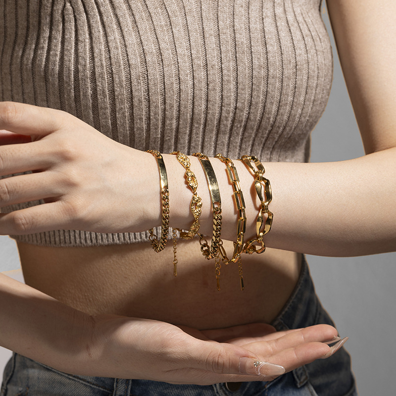 TENA Europa y América de moda 18 quilates de oro de acero inoxidable pulsera de mujeres transfronterizas de moda popular nueva superposición con joyas de mano