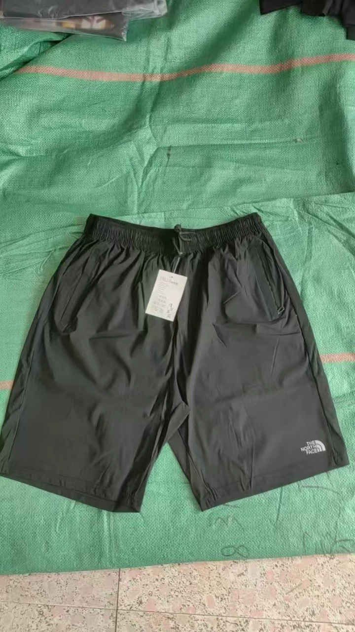 Спортивные шорты с эластизом из ледяного шелка для мужчин повседневные пляжные брюки быстрохненные тонкие укороченные брюки