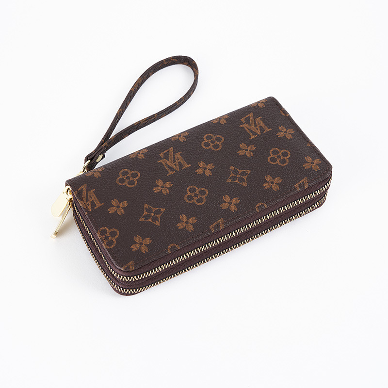 Cartera larga para mujer nueva 2025 popular europea y americana de gran capacidad con doble cremallera bolso para teléfono móvil bolso de mano con letras impresas