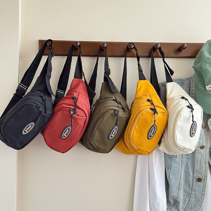 Bolsa de pecho coreana para niños, letras extranjeras, bolsas de cintura deportivas para niños, 2025 nuevas bolsas de comercio exterior para niños