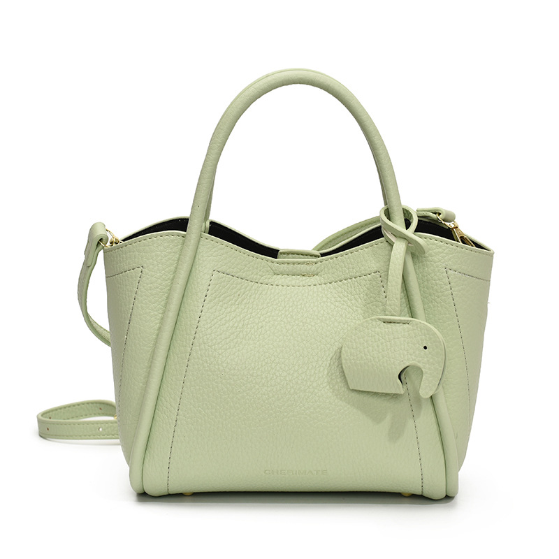 Tendencia transfronteriza de moda canasta de platos de mano 2025 nuevo nicho de alta sensación bolso de hombro bolso de cubo universal para mujeres