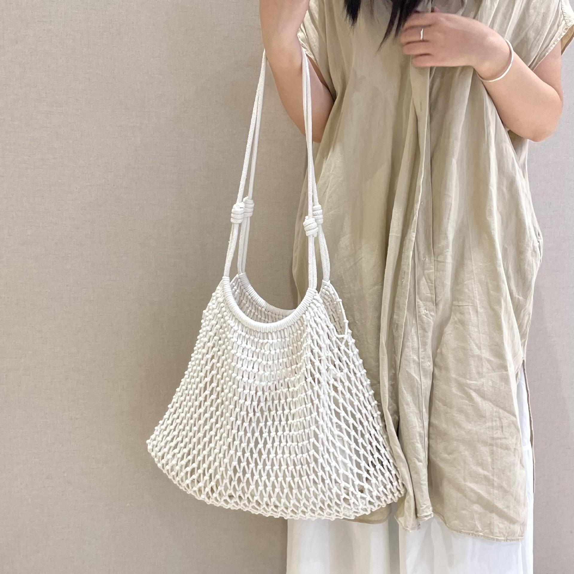 新款小众高级感镂空包手工扇形草编渔网包大容量时尚编织女包