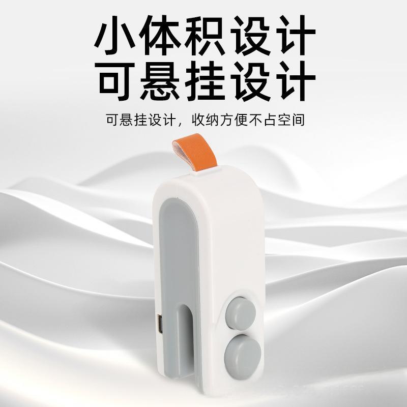 Máquina de carga pequeña para el hogar transfronterizo Mini máquina de sellado Sello de bocadillos Máquina de sellado de plástico a presión manual Sello de bolsa de plástico