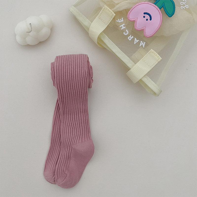 Nuevo color sólido rayas verticales polainas de las muchachas del otoño y el invierno estilo coreano ocasional los niños ropa exterior pantimedias blancas en stock