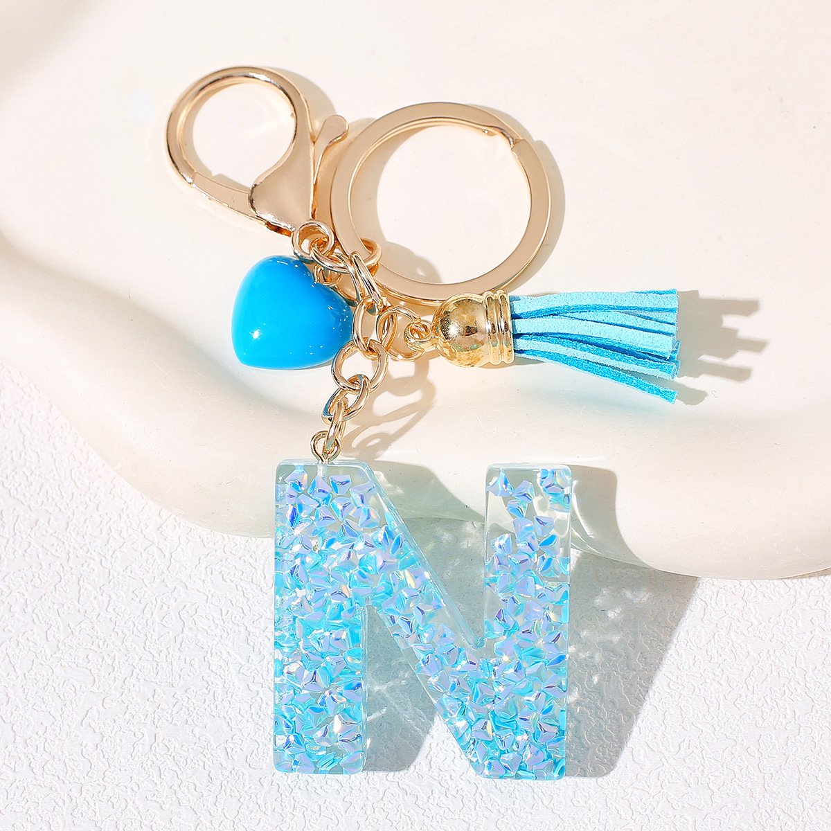 Nuevos productos azules de amor con frascos de letras lindos enclavadores decoraciones europeas y americanas populares llaveros damas