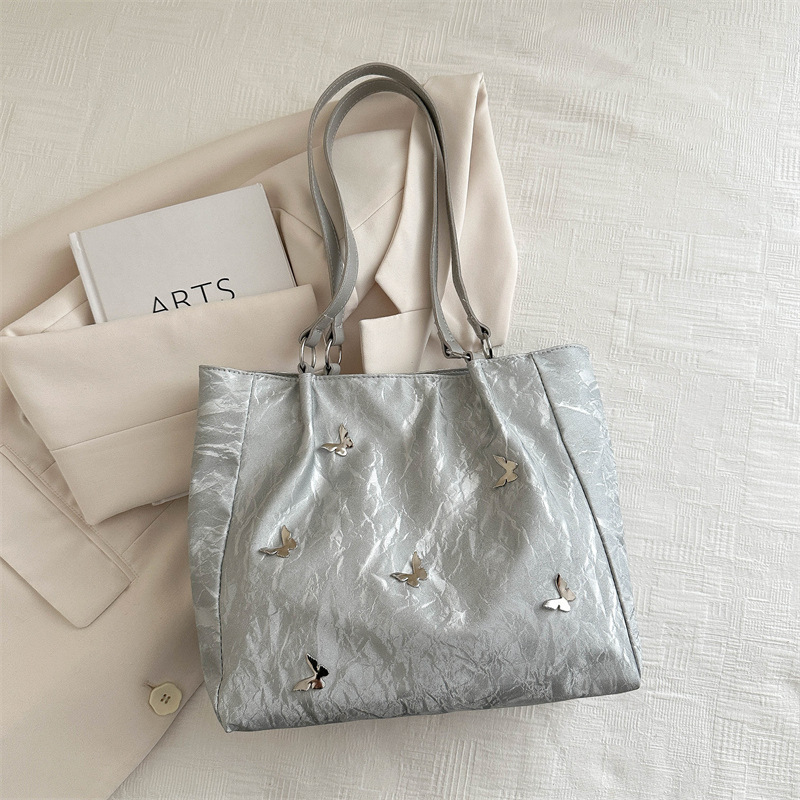 Bolso de viaje popular de gran capacidad de este año 2024 nuevo arco de moda bolso de hombro de mujer bolso universal