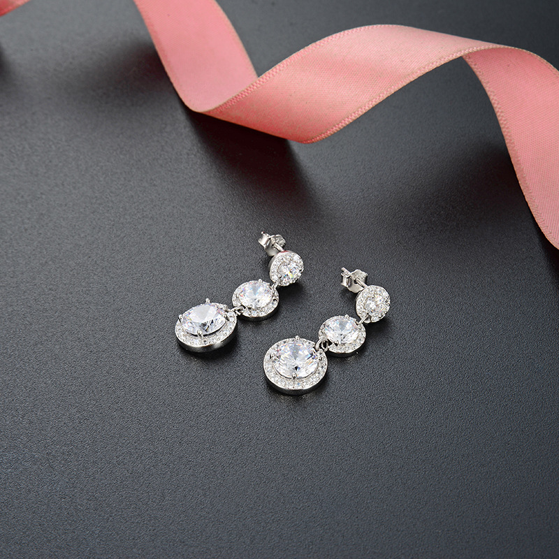 Cruz-frontera con diamantes incrustados pequeños accesorios populares frescos pendientes de circón japonés y coreano pendientes de las mujeres elegantes pendientes redondos