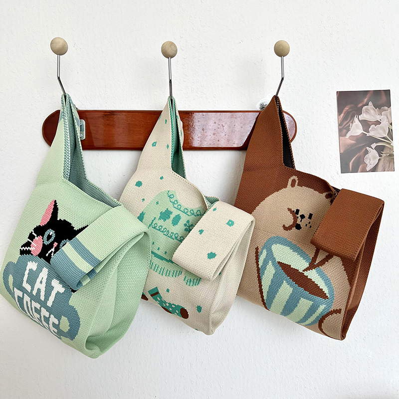 Bolsa de mano de damas nicho diseño de dibujos animados de punto chaleco de punto regalo de mano mochila de hombro al por mayor