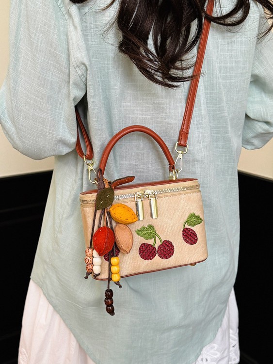 Bolso de alta sensación para mujeres 2026 nueva moda impresión de moda bolso de mochila cadena retro caja de mano bolso pequeño