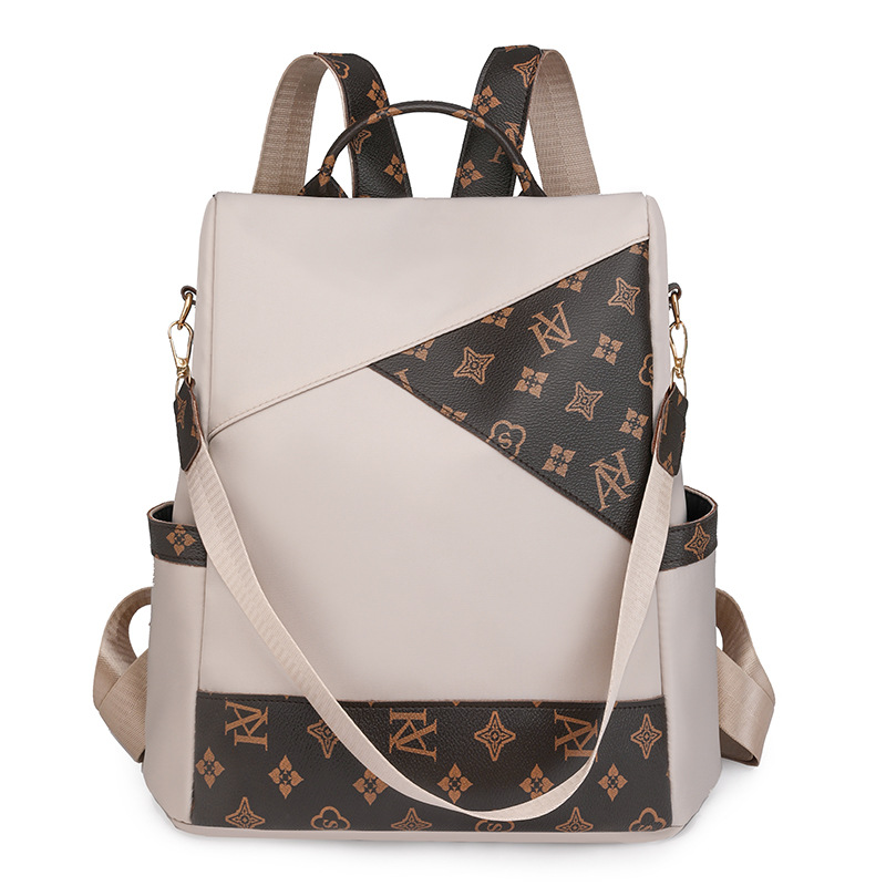 Comercio exterior al por mayor 2024 nueva mochila antirrobo de nailon para mujer retro, mochila multifuncional de doble uso de color de contraste de moda