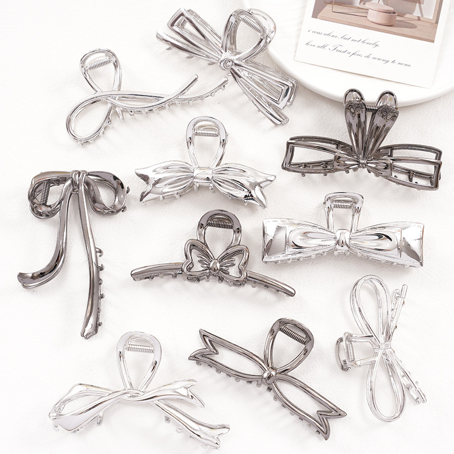 IG Style Shiny Women's Bow Knot Zinc Alloy Imitation Pearl Rhinestone Hair Claws display picture 4