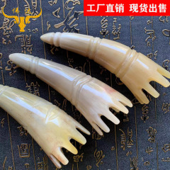 牛の角の新型の髪を洗って白いヤクの角の先の金を洗って花の形の牛の角を洗ってマッサージして髪を洗って櫛のメーカーを洗います。