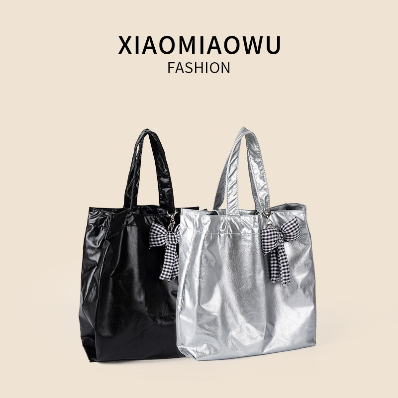 Niche underarm bow, Korean style tote with texture, large capacity, high-end feel, new shoulder bag for commuting_voghion.com