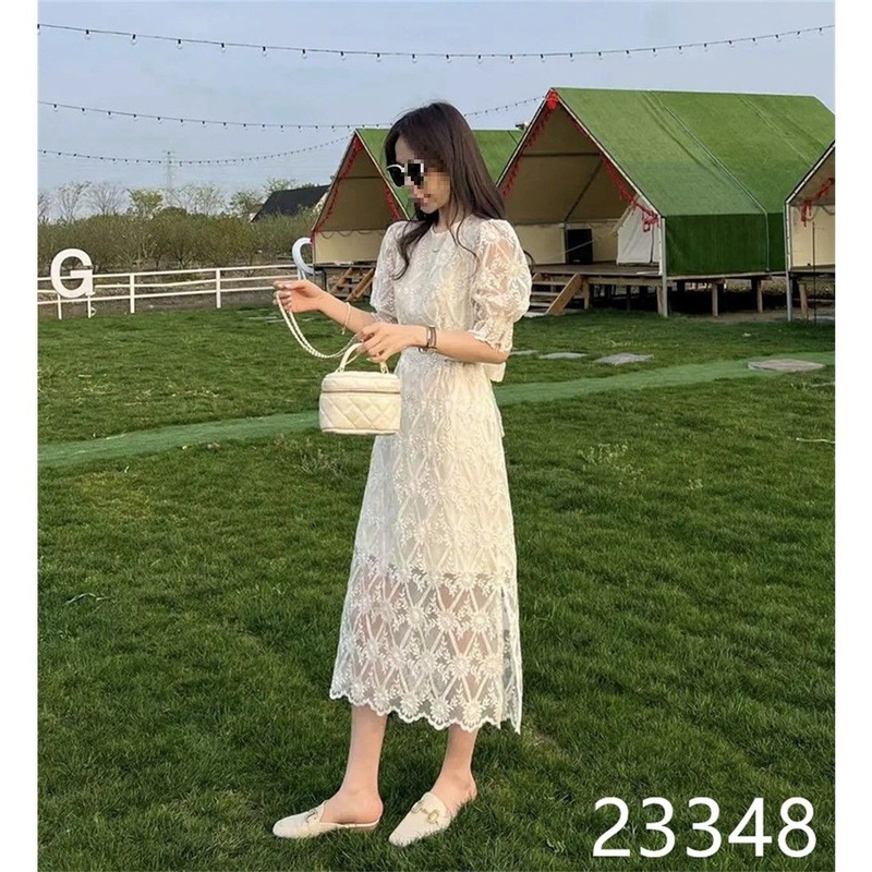代発の風光の美しい菱のレースのワンピースの女性の新型の韓国版の気質は細くて長い中の純色の字のスカートを現します。|undefined