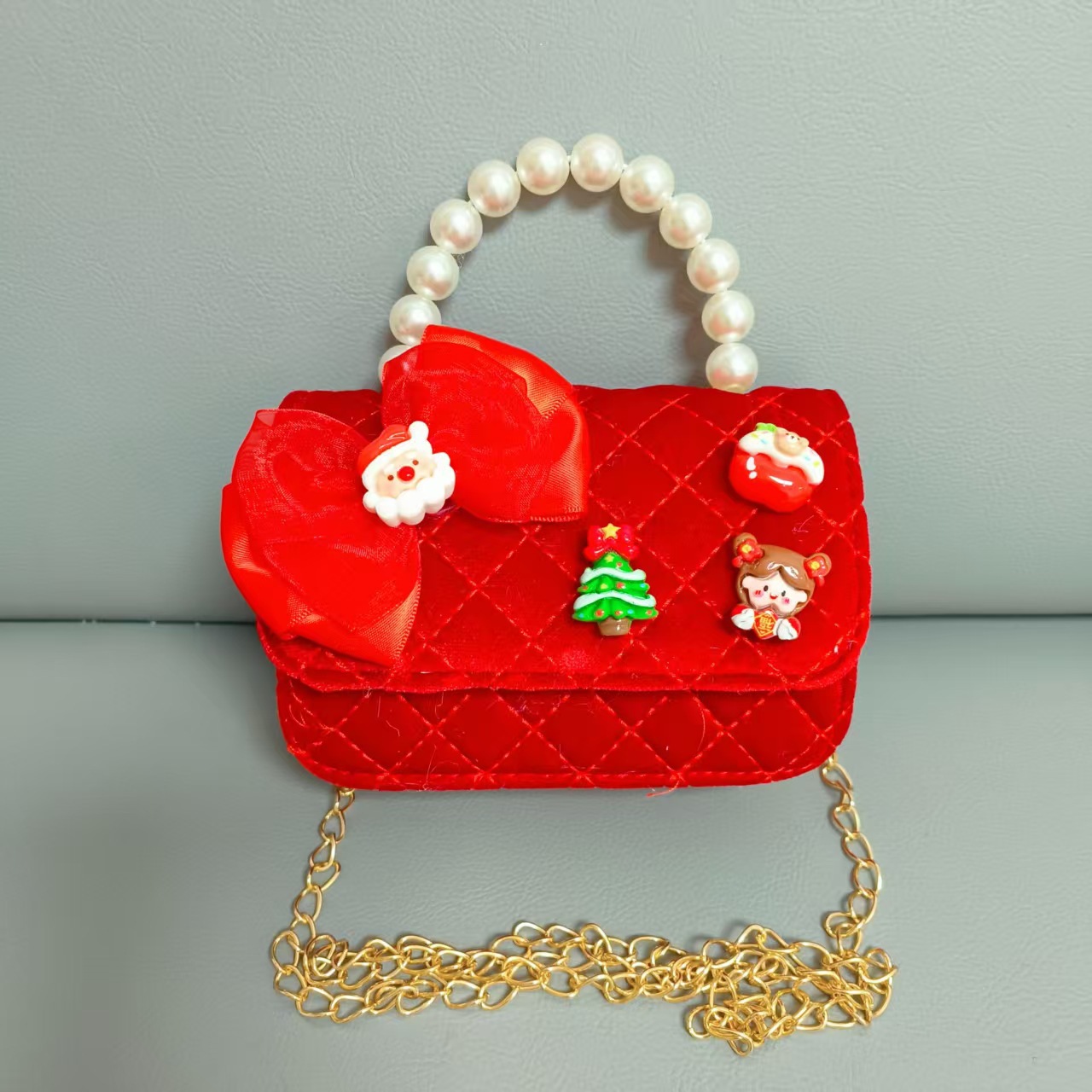 Cartera de Año Nuevo rojo arco de papá Noel bolso de perla pequeña cadena de viento fragante bolso de hombro