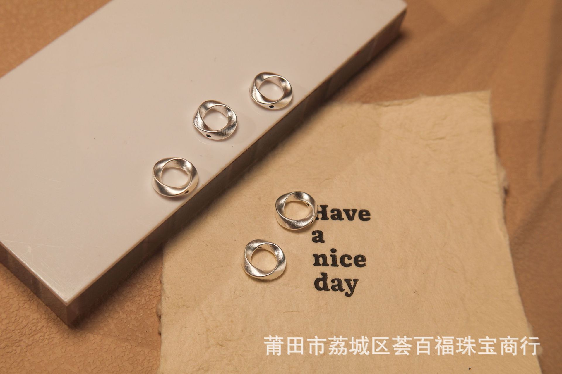 Pure silver s999 Möbius 3D hard silver accessory, hollow fashion niche light luxury ins handmade silver spacer bead accessory
