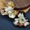 UV gold-plated three-petal flower + silver bottom pearl