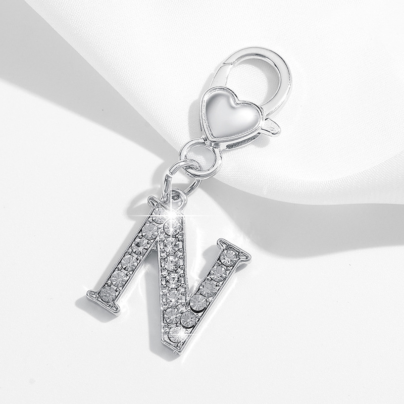 Europa y los Estados Unidos hermosa mini full-inlaid 26 letras inglesas personalidad transfronteriza joyería llavero accesorios colgantes