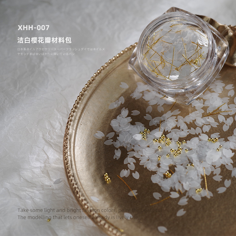 Super Hada pétalo lentejuelas bola de acero hilo de seda material paquete joyería Tiktok red nail art Cerezo flor lentejuelas Aurora