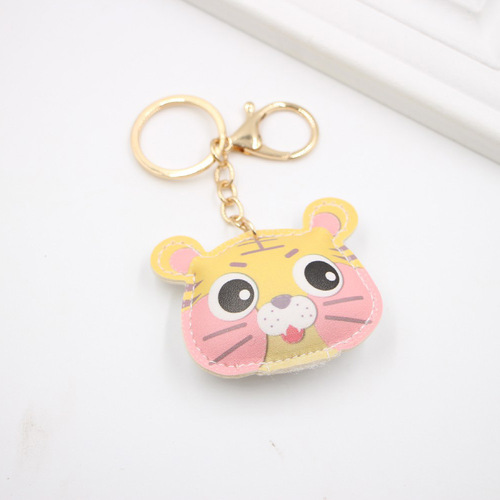 Cross-border classic cute little tiger PU leather keychain European and American student schoolbag tiger car pendant