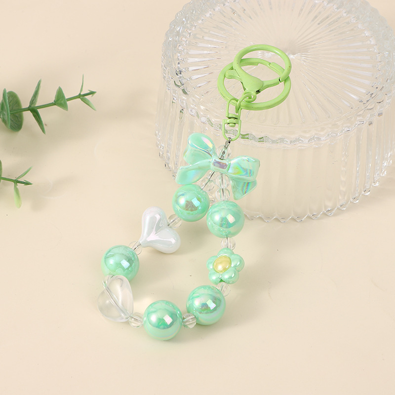 Japón y Corea del Sur color ins hecho a mano con cuentas flor llavero cordón de muñeca macaron color pétalo cordón de teléfono móvil en stock