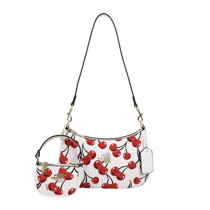 Bolsos nuevos transfronterizos para mujer 2025 moda y todo fósforo de alta gama bolso de axila de un solo hombro bolso de mensajero portátil con estampado clásico