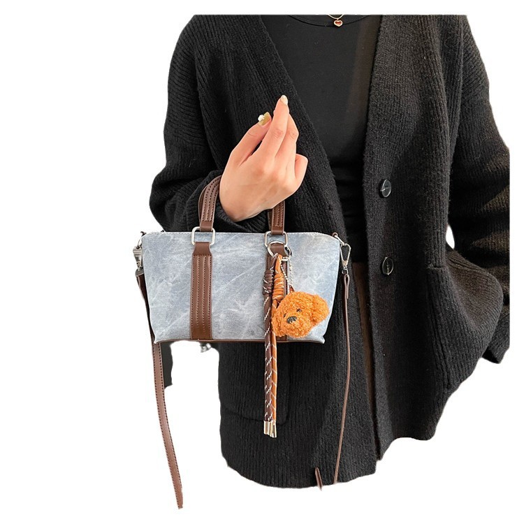 휴대용 버킷 가방 여성의 2024 새로운 도착 여성 가방 유행 캐주얼 어깨 가방 간단한 복고풍 크로스 바디 백