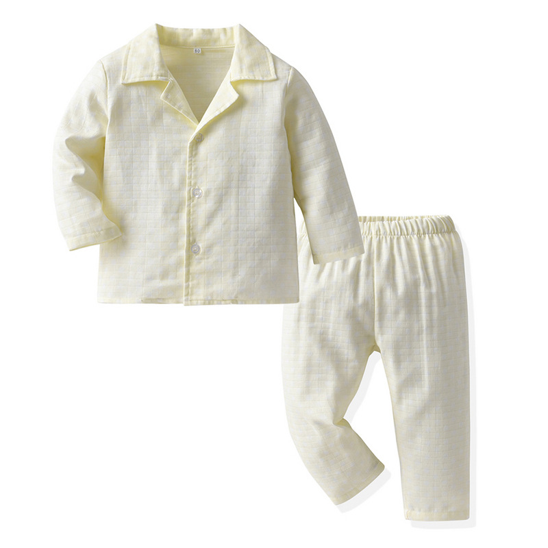 2025 nuevo pijama infantil hombre y mujer bebé retro punto de onda neutro manga larga ropa doméstica para niños pantalones largos dos piezas