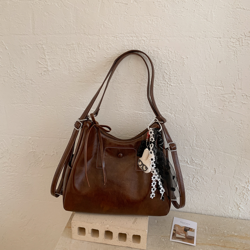 Bolsas transfronterizas de gran capacidad para mujeres 2026 retro nicho mochila de hombro de viaje ocio mochila tote