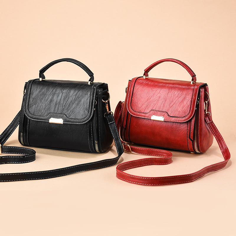 Bolsa de mano para mujeres Taizhou bolsas de mujer retro bolsas de hombro de hombro universal de moda alta sensación de bolsas de madre