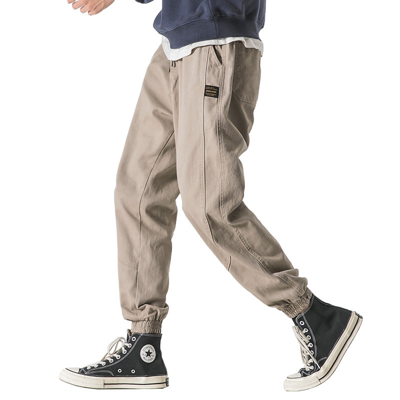 Monos de marca de moda Primavera y otoño de los hombres nuevos pantalones casuales atados al tobillo estilo coreano sueltos Pantalones deportivos flacos de moda para todos los partidos