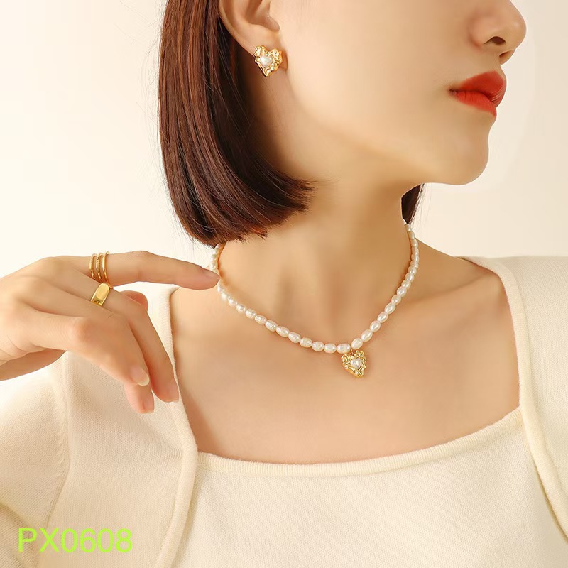 Nuevo collar de otoño y invierno no se desvanece perla de amor anillo colgante de alta sensación suéter cadena de lujo ligero conjunto de adornos