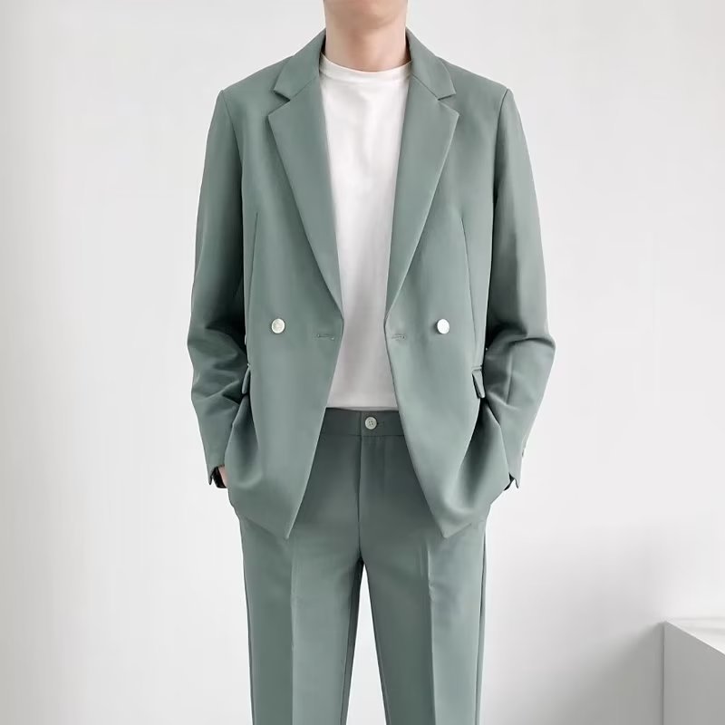 スーツのスーツの男性の韓国版の修身のごろつきはかっこいいです。