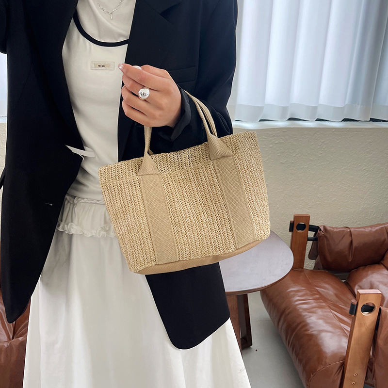 2026 nuevo bolso de paja de verano de gran capacidad para mujeres bolso de balde de tejido japonés simple bolso de playa de viaje