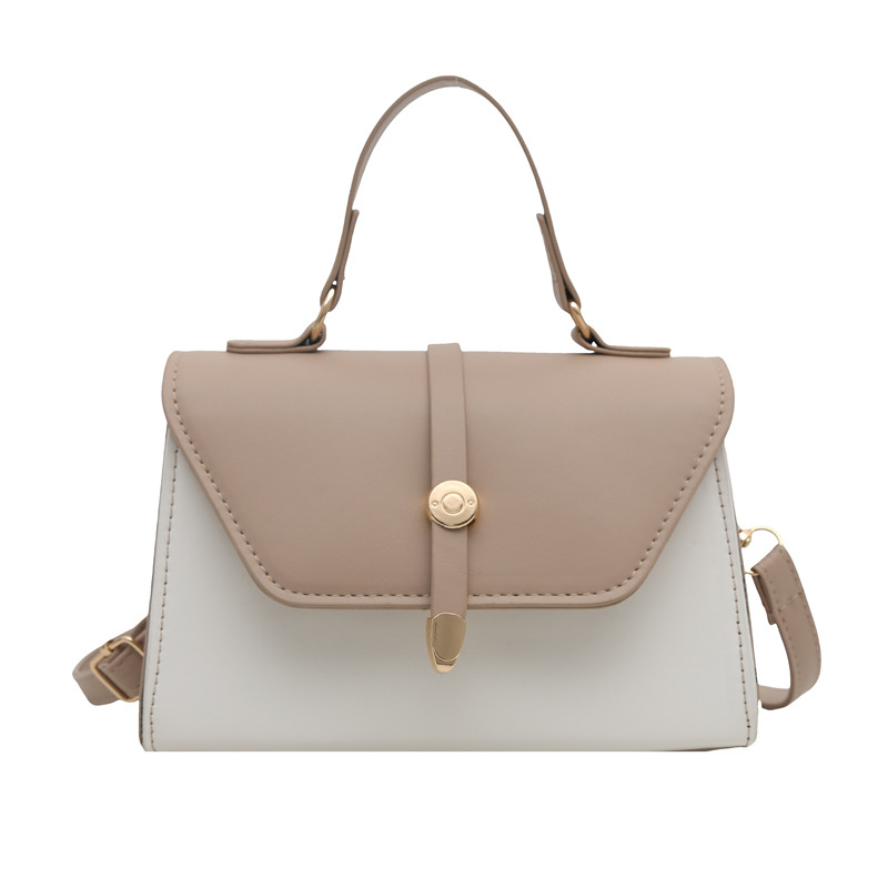 Bolsa de mano de textura de empalme retro para mujeres 2025 nuevo estilo simple y casual de moda extranjera bolso de hombro