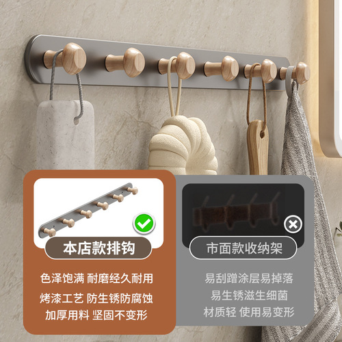 Hook-free wall-mounted stainless steel clothes hanger for kitchens and bathrooms, suitable for hanging clothes and towels on the back of doors without drilling holes.