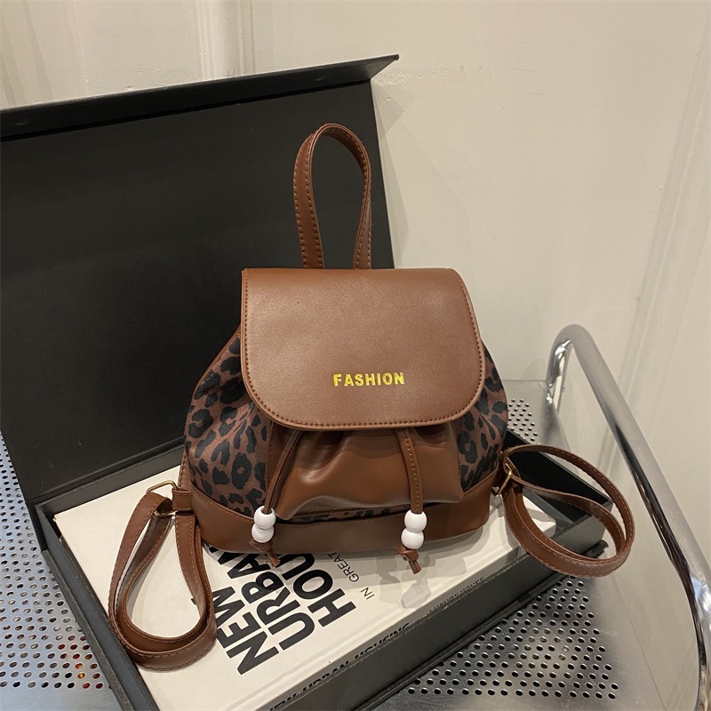 Bolso para mujeres 2025, nueva mochila retro de gran capacidad, moda casual, leopardo de otoño, bolso de hombro, bolso de mano