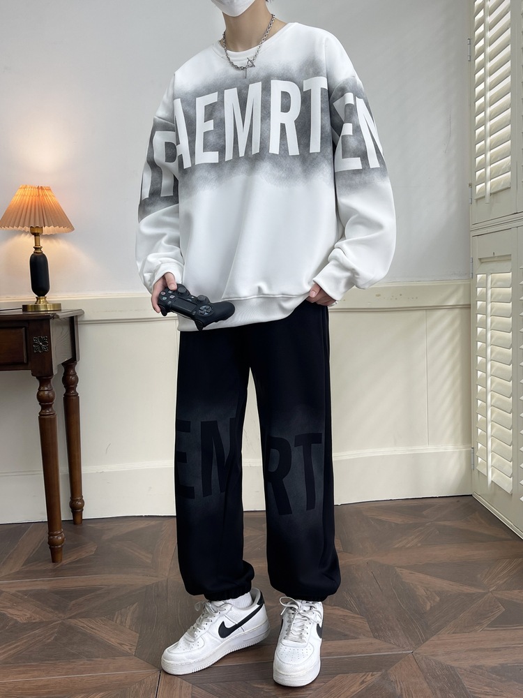 Los fabricantes de origen producen logotipos personalizables, trajes deportivos y casuales sueltos de moda para hombres, pantalones de suéter para hombres