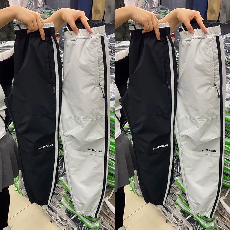 Trendy Marke Color Blocking Design Casual für Männer 2024 dünner Stil Harem modische vielseitige Neun-Punkt-Sporthose_voghion.com