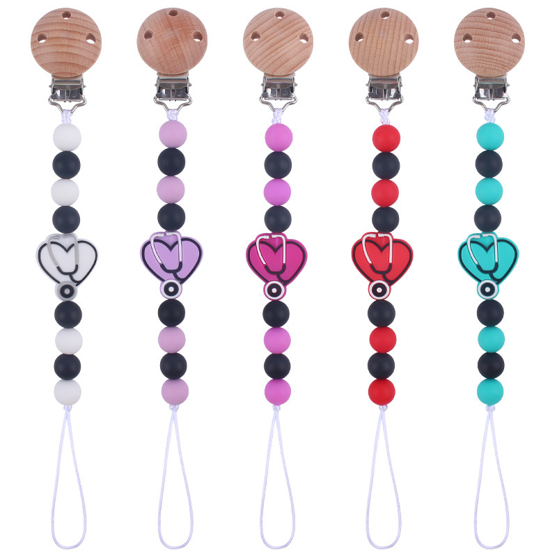 Nuevo bebé suministros de dibujos animados mariposa silicona mordedor calmante bebé DIY mordedura pegamento cadena anti-gota cadena