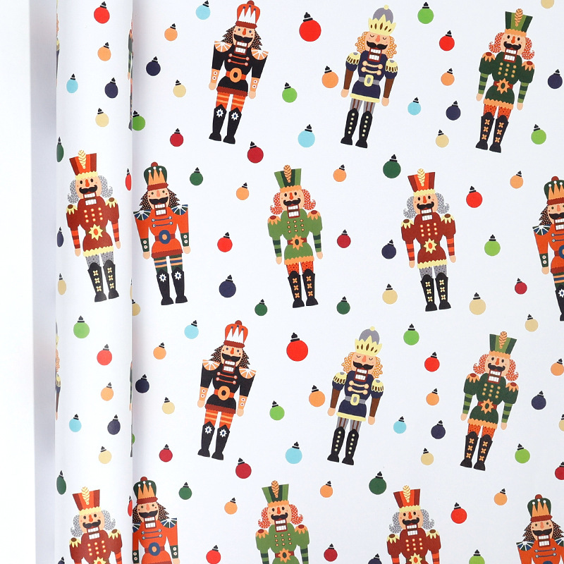 Papel de regalo navideño clásico y popular de gran tamaño con diseño de dibujos animados y temática navideña para envolver regalos.
