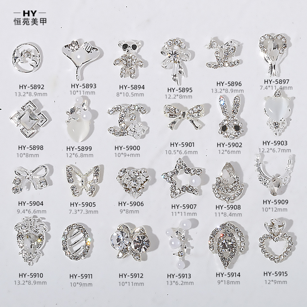 Venta caliente taladro de uñas arco de plata joyería tridimensional flash diamante esmalte de uñas decorativo diamante acabado pieza de uñas traje de joyería